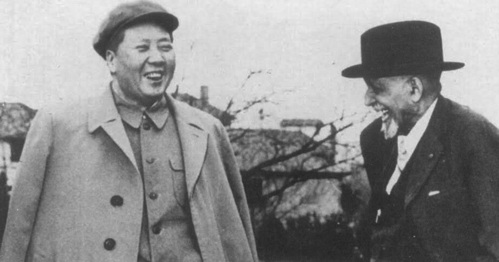 Du Bois shaking hands with worlds greatest mass murder Mao Zedong