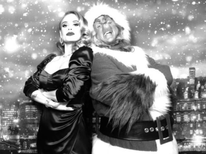 Adele with Xmas hog Father Grinch