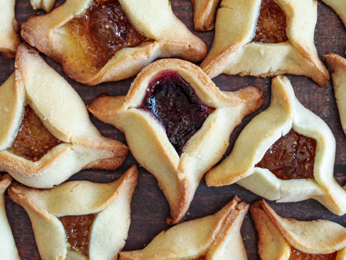 these triangular baked pockets filled with poppy seed or other sweet fillings