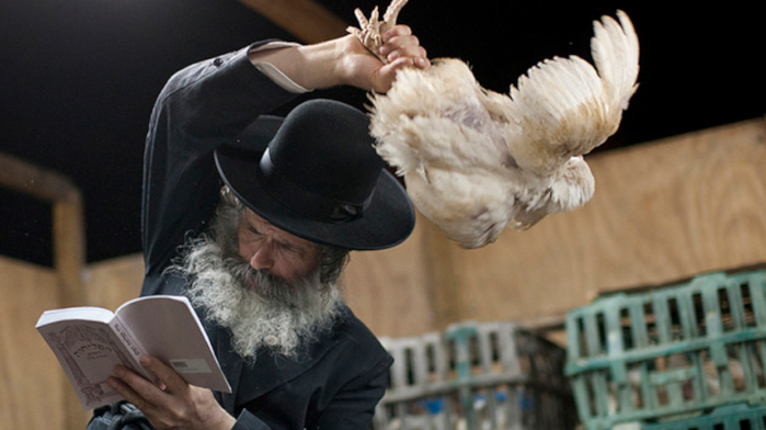 An Orthodox Jew beats a cockerel to death over his corona during cruel kapparot ritual believing this will cure his sin during Yom Kapur.