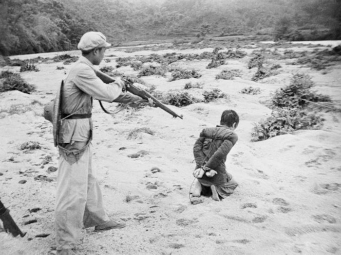 A landlord is put to death by Communist revolutionaries, Guangdong, circa 1953