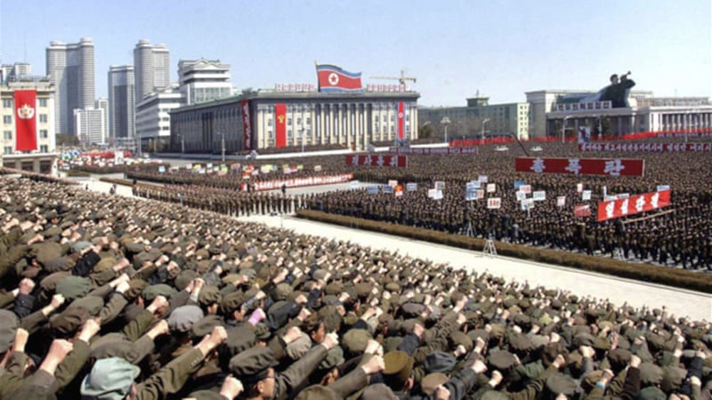 Rare picture of North Korea parade performing NAZBOL fist salute.