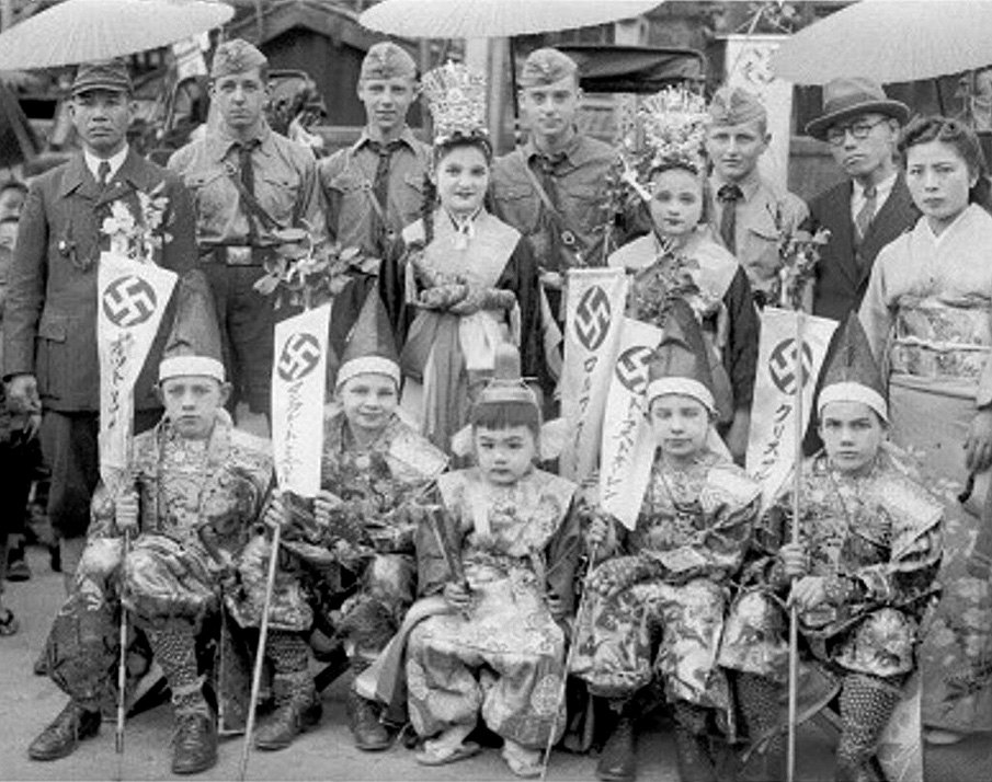German Hitler Youth with their Japanese comrades and children