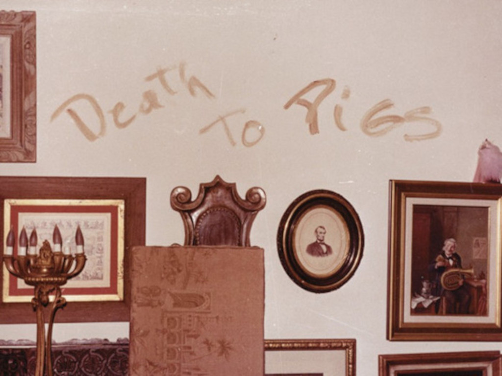 Death to Pigs written in blood upon Manson Family house wall