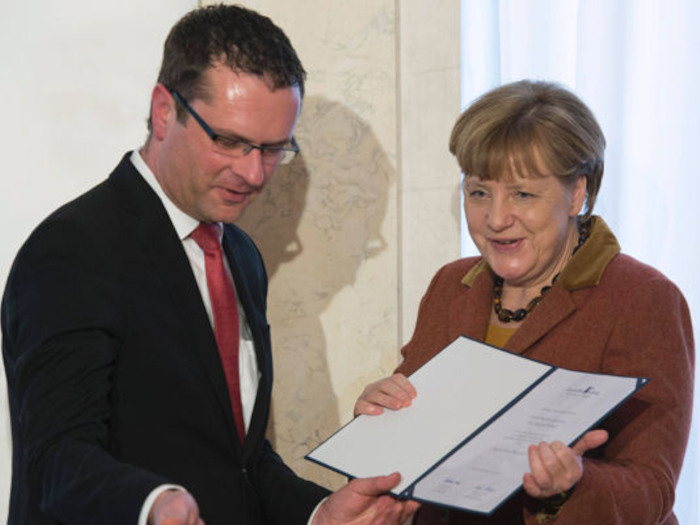 Angela Merkel beamed as she received the Eugen-Bolz-Award